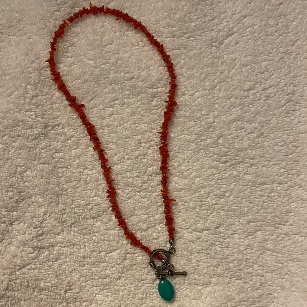 Red stone necklace with blue stone